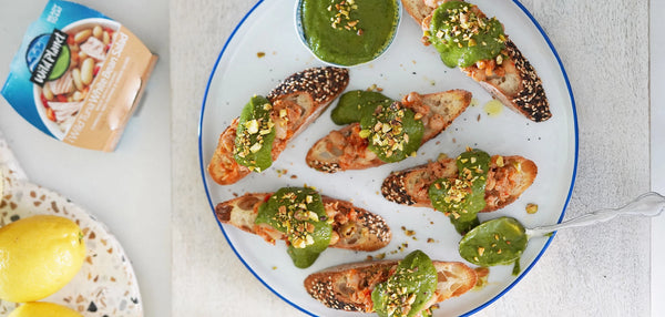 White Bean Tuna Crostinis with Pistachio Pesto