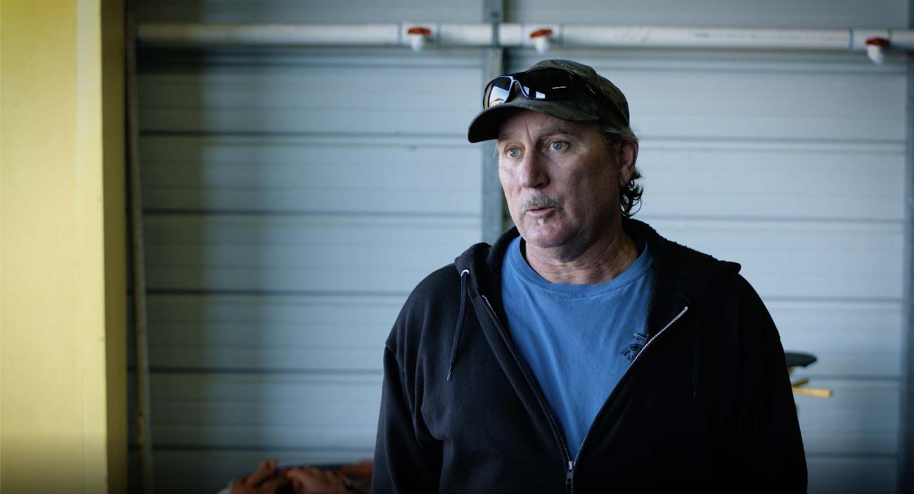 A man (Fisherman) being interviewed